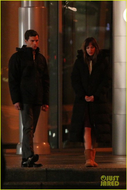 Jamie Dornan and Dakota Johnson rehearse scenes and go over the script with director Sam Taylor Johnson outside of Grey Enterprises before shooting in the freezing temperatures for 'Fifty Shades Of Grey' in Vancouve